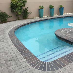 pool with nice pavers all around