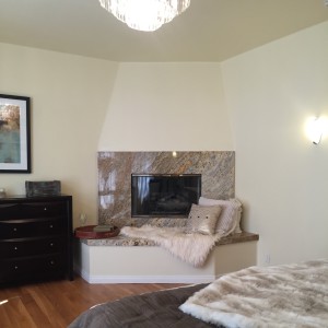 the master suite is on the first floor at the front of the house and has a lovely fireplace.