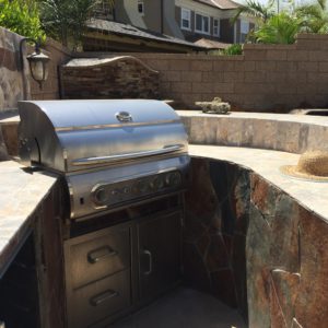 built-in barbecue and raised eating counter to the right