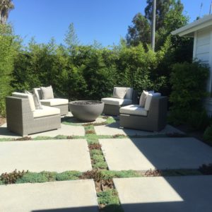 front yard fire pit with complete privacy due to the high fence around